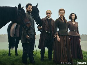 Outlander Season 7 still of Jamie Fraser, Claire Fraser, Brianna Fraser and Roger MacKenzie